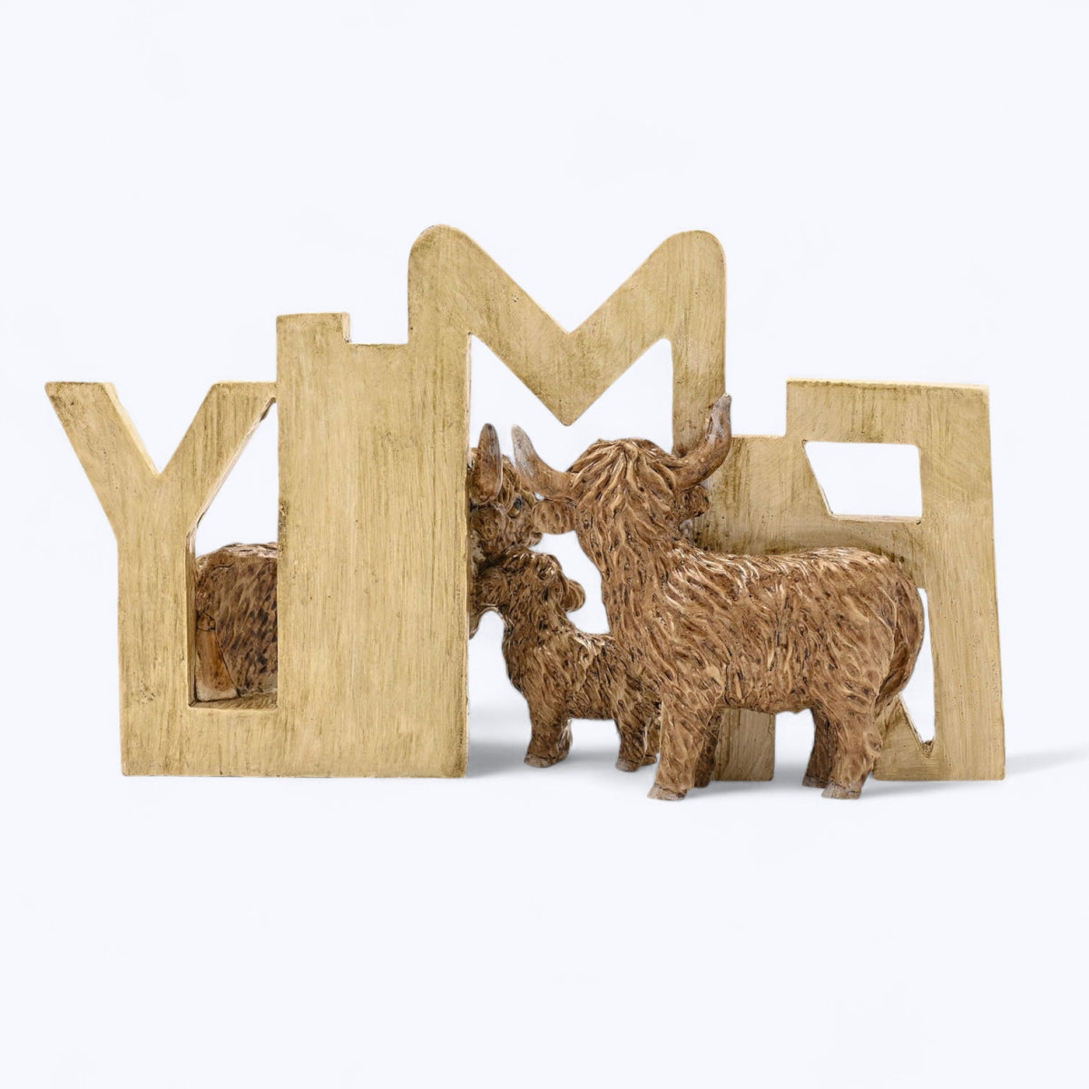 Wooden FAMILY plaque featuring three brown Highland cow figurines amid letter cutouts