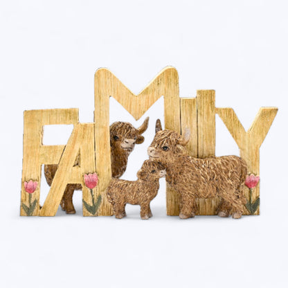 Wooden FAMILY plaque with three brown Highland cow figurines and tulip accents
