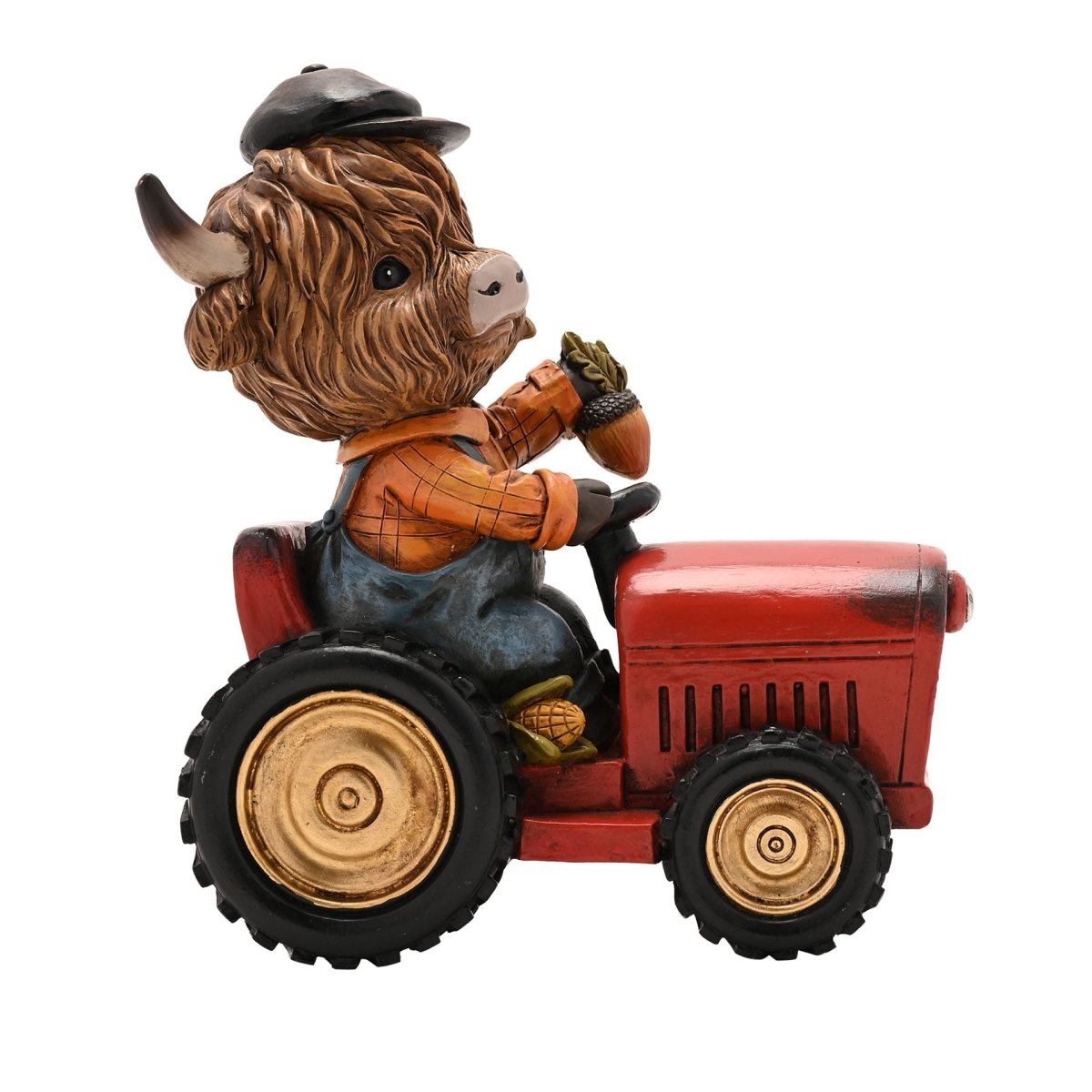 The Fashion Gift Shop: Highland Cow sits happily on a tractor, creating a charming rural scene by Country Living, Animal Ornament