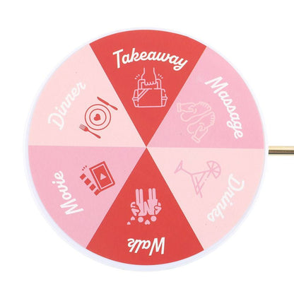 Segmented game wheel with red and pink wedges labeled Takeaway and more