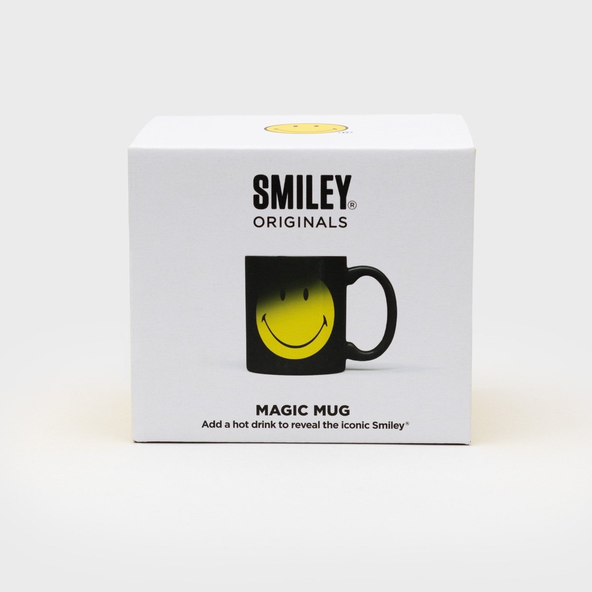 Smiley Magic Mug gift box showing a black mug with smiling yellow face