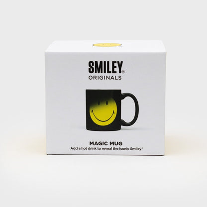 Smiley Magic Mug gift box showing a black mug with smiling yellow face