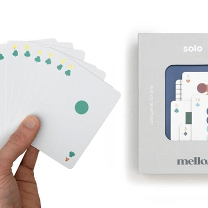 Solo Mello playing cards: hand holds white cards with green suit icons