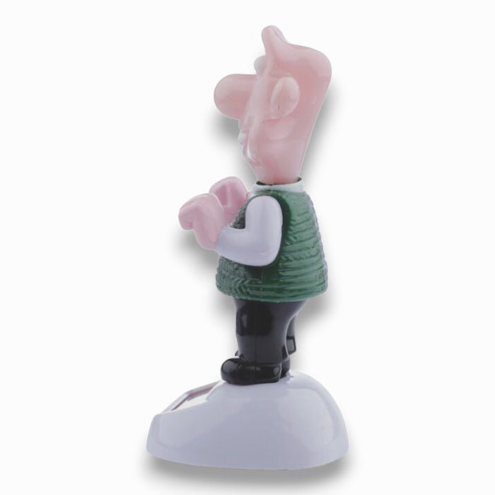 Solar-powered Wallace figurine rear view with green sweater and black boots