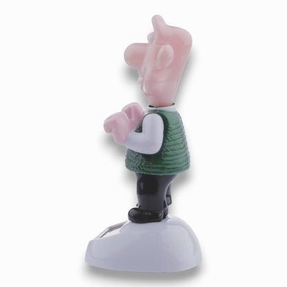 Solar-powered Wallace figurine rear view with green sweater and black boots