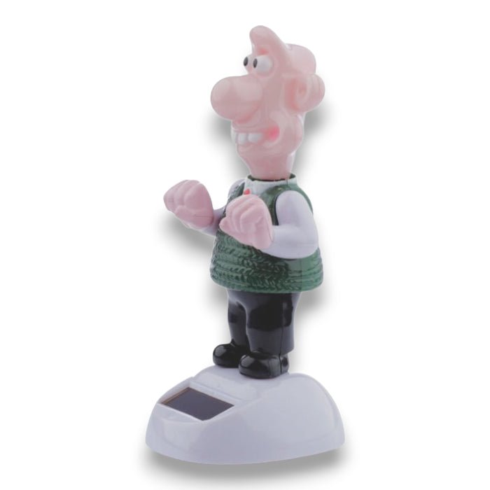 Solar-powered Wallace figurine side view with green knitted sweater and black boots