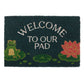 Welcome to Our Pad Doormat Featuring a Sweet Frog and Lily Pad Design - The Fashion Gift Shop Door Mats by Mindful Frog