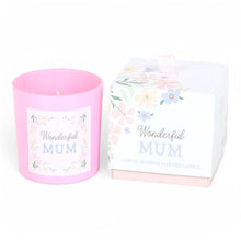 Pink scented candle jar beside white gift box with 'Wonderful Mum' floral design