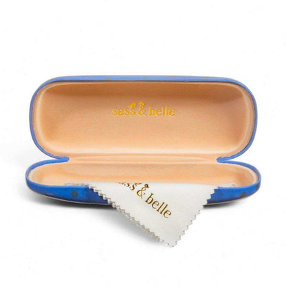 Open blue cat glasses case with beige lining and “sass & belle” logo on top