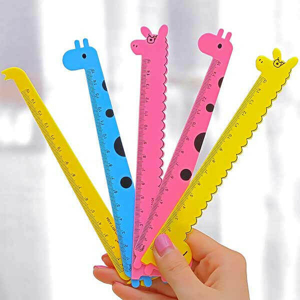 Animal-shaped kids rulers: blue, pink, and yellow with llama and giraffe heads