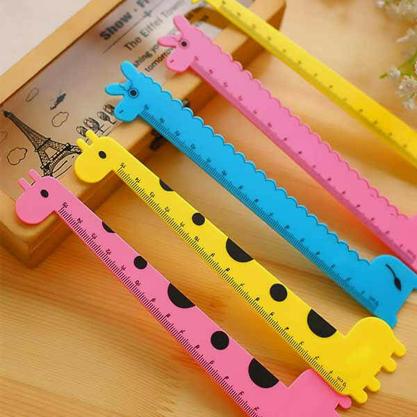 Animal-shaped kids rulers in yellow, blue, and pink with giraffe and llama figures