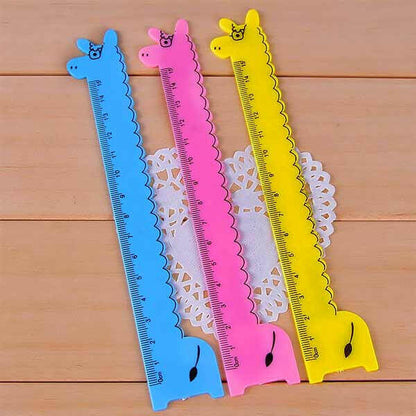 Animal-shaped kids rulers with blue, pink, and yellow giraffe and llama shapes