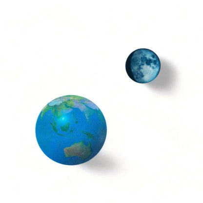 Pair of fridge magnets with large blue Earth globe and small blue moon sphere