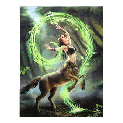 Canvas art plaque close-up: sorceress on horse with glowing green magic swirl