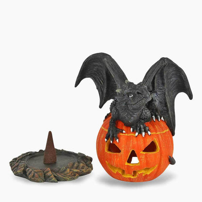 Dragon cone burner with black wings, orange jack-o’-lantern, and separate cone stand