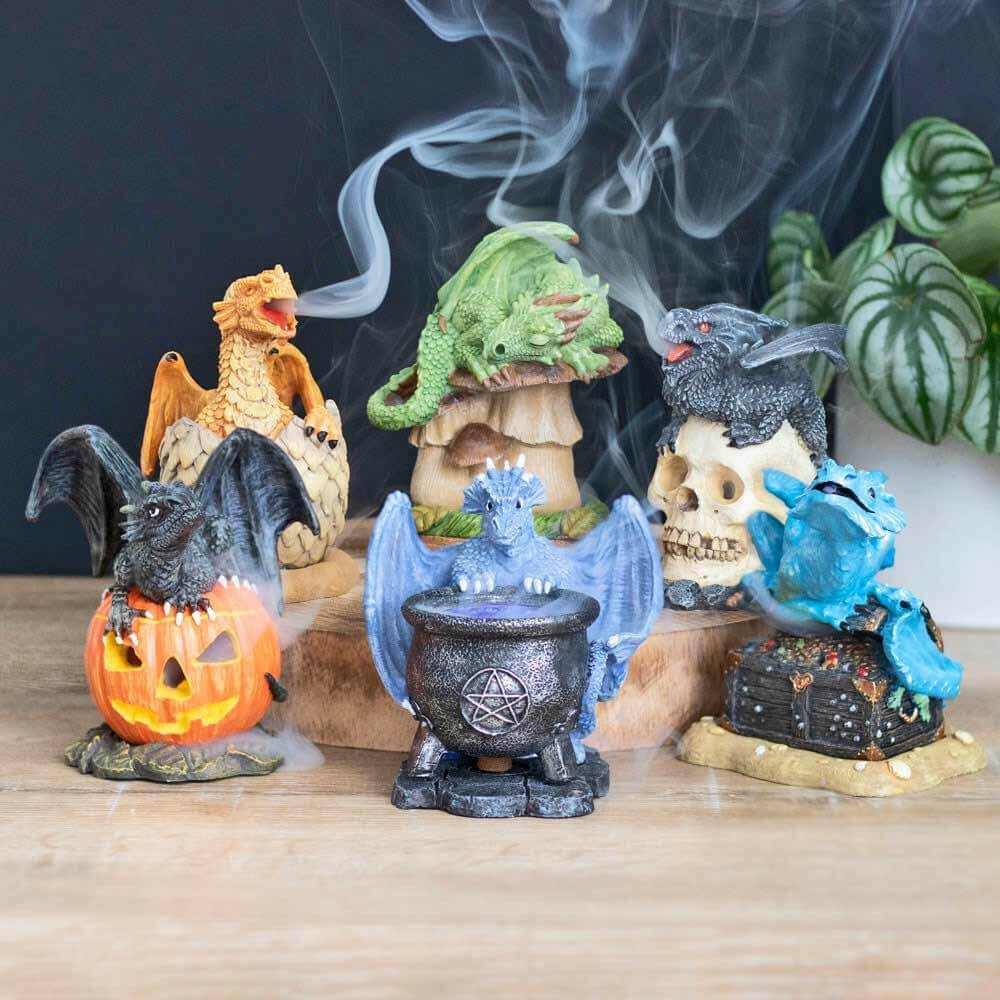 Halloween dragon cone burner figurine with orange jack-o’-lantern and visible incense smoke