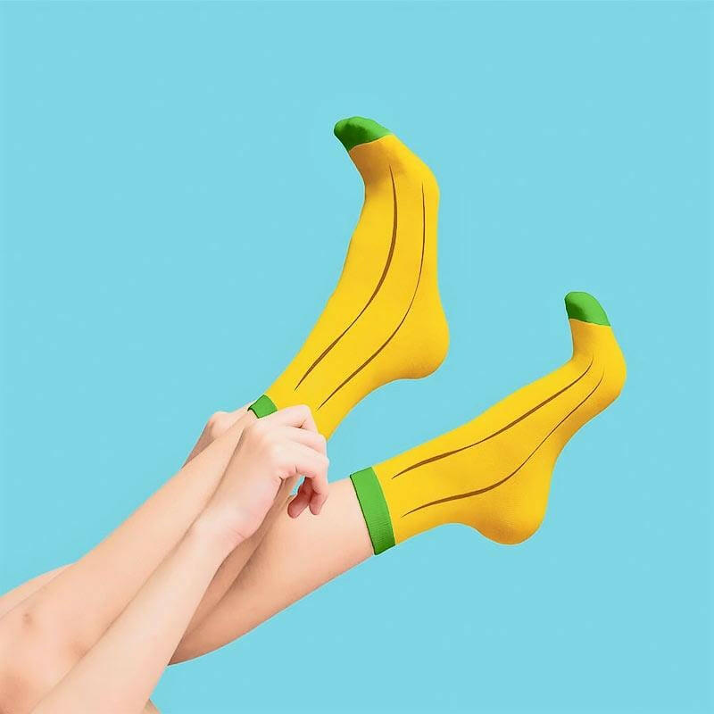 Banana fruit-themed socks, yellow with green-striped cuff