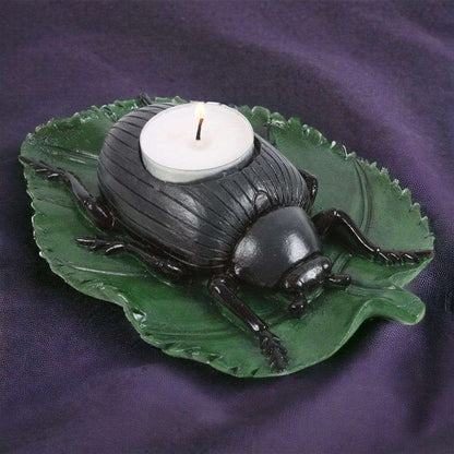 Beetle tealight candle holder featuring green leaf tray and black beetle with white tealight