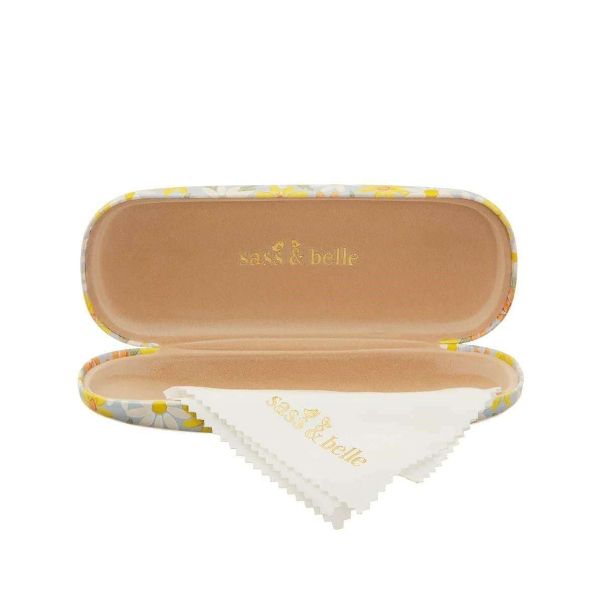 Glasses case open to reveal beige lining and a white triangular cleaning cloth