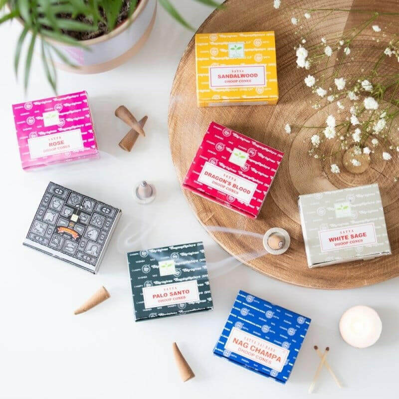 Incense cones assortment with Satya boxes and terracotta cone tips, with holder.