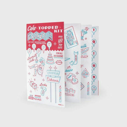 Cake topper kit package showing assorted pop-out decoration cards