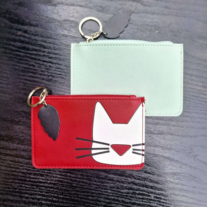 Set of mint and red cat-face faux leather keyring purses with zipper tops and rings