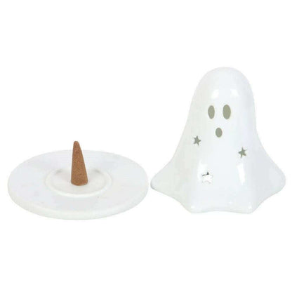 White ceramic dual ghost holder set with incense cone on round plate beside ghost base