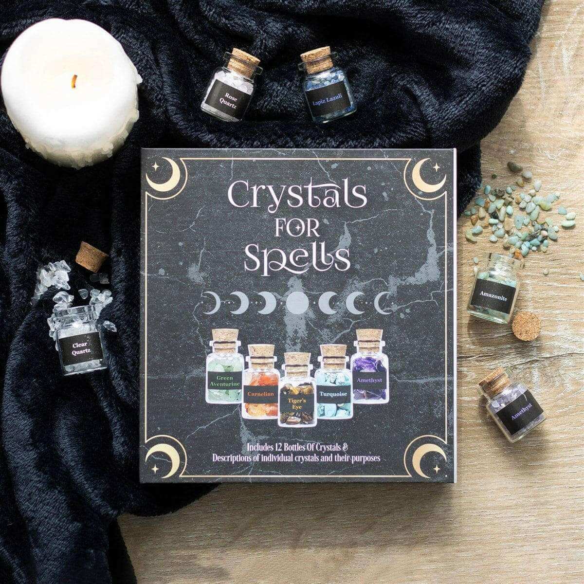 Crystal chip bottle gift set box with assortment of small labeled glass jars