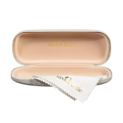 Open dachshund glasses case with beige lining and “sass & belle” on inner lid