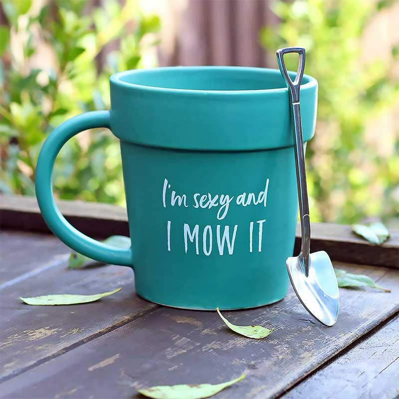 Teal plant pot style mug with shovel spoon and "I'm sexy and I MOW IT" text