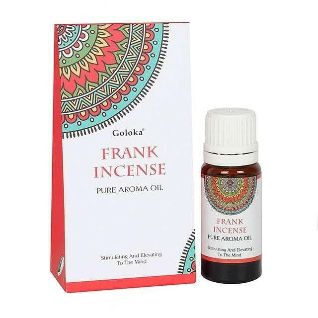Incense aroma oil bottle with white cap and red label, shown with product box