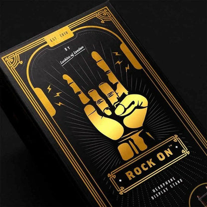 Rock On headphone stand gift box with gold hand graphic and ROCK ON lettering