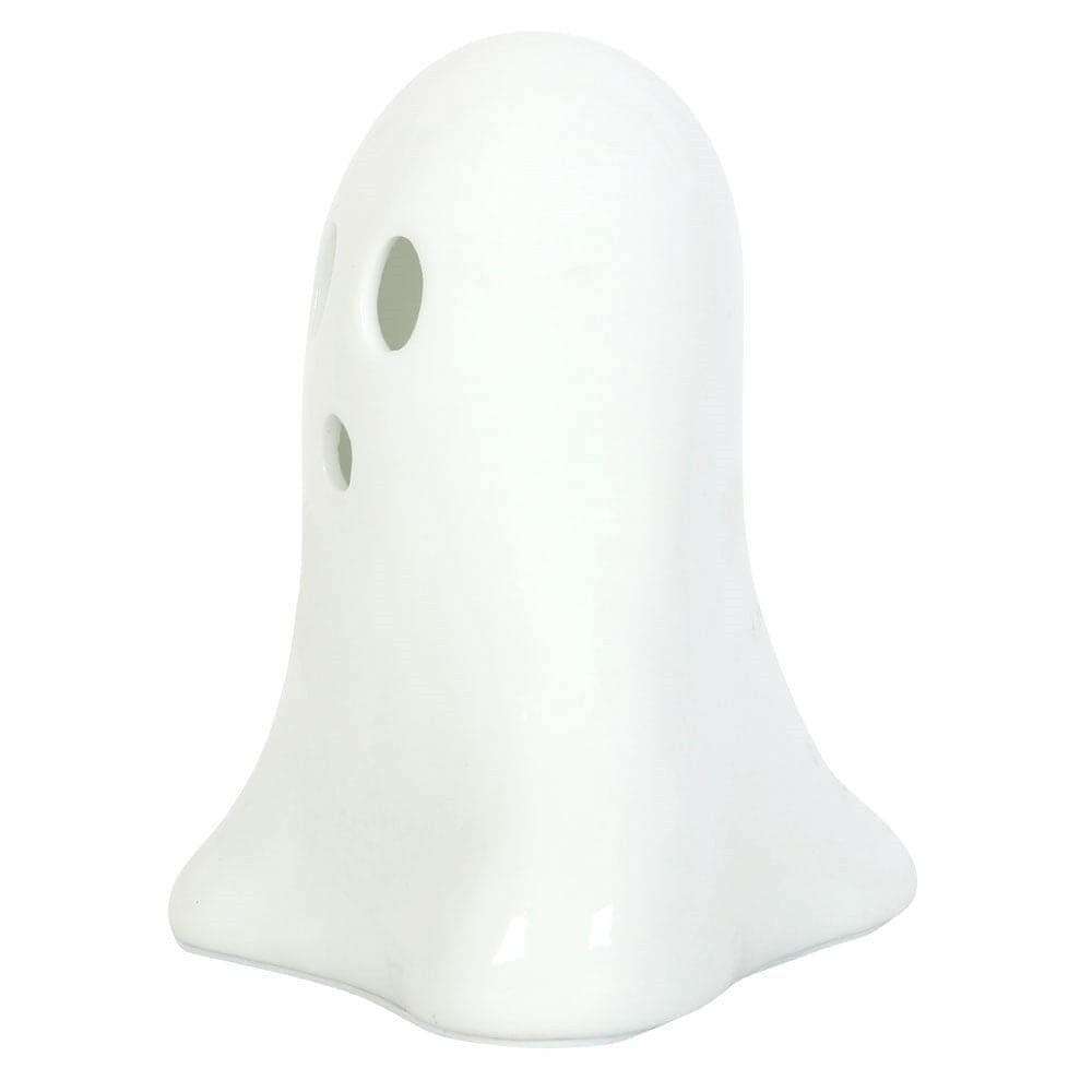 White ceramic ghost night light side view with oval eye cutouts, unlit.