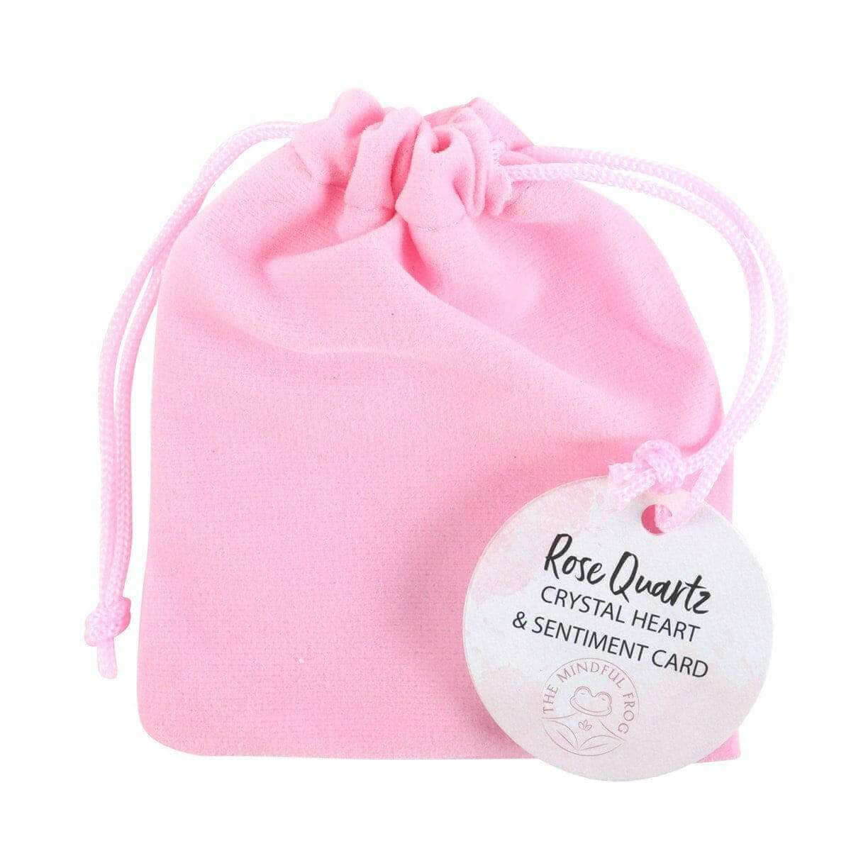 Pink drawstring pouch with rose quartz heart sentiment card attached