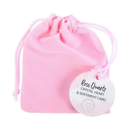 Pink drawstring pouch with rose quartz heart sentiment card attached