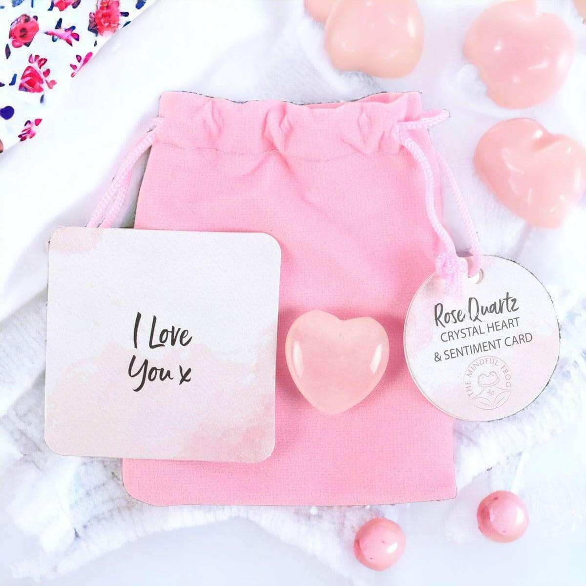 Pink drawstring pouch with rose quartz heart and sentiment card