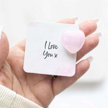 Rose quartz sentiment card with “I Love You” and a pink heart