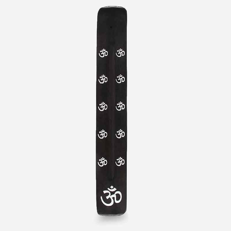 Black wooden incense stick holder with repeating Om symbols