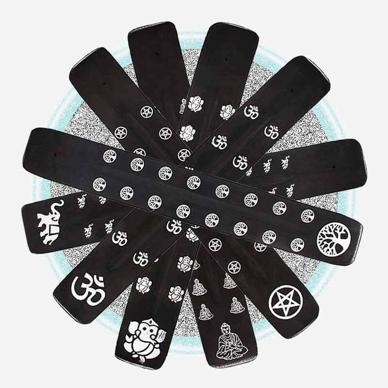 Black wooden incense stick holder cross with assorted spiritual symbols