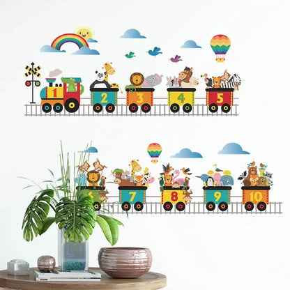 Animal train wall stickers with numbered cars, jungle animals, clouds, and rainbow