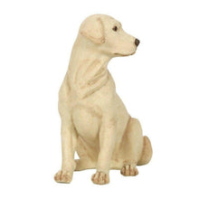 Beige Labrador dog ornament figurine, side view, sitting pose