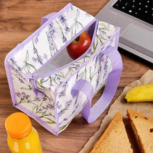 Lavender floral insulated lunch bag with zip top, open to show compartments