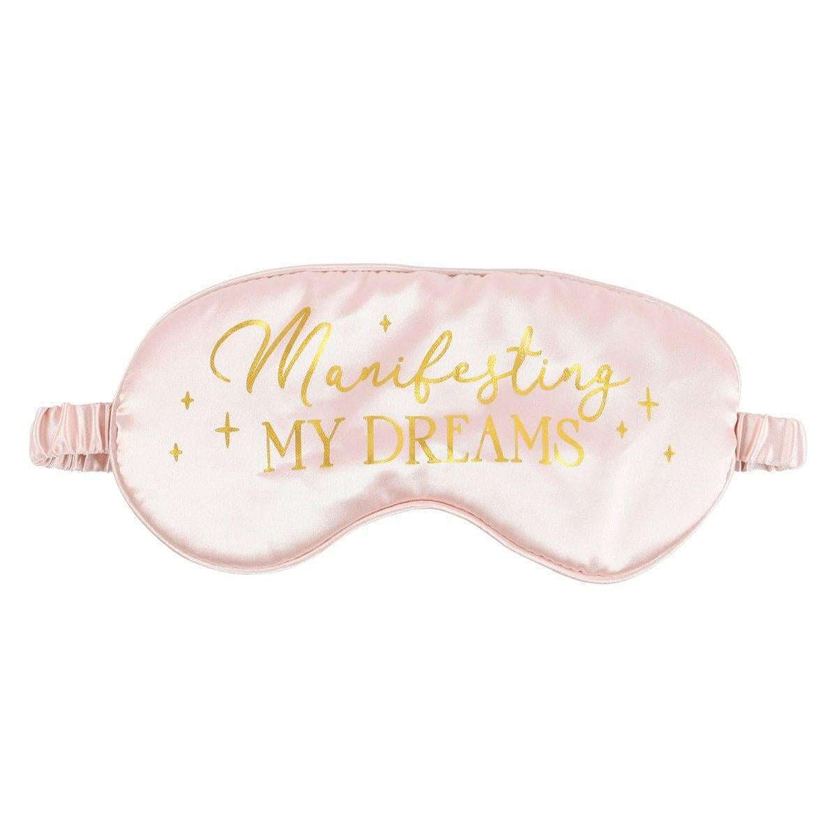 Satin sleep eye mask with blush satin finish and gold “Manifesting My Dreams” text