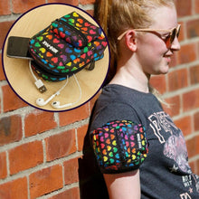 Mini backpack pouch with colorful heart pattern, front zip pocket and carabiner clip