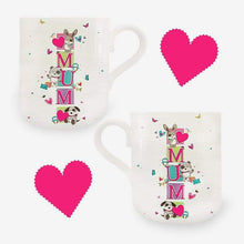 Set of Mothers Day mugs with cream “MUM” animal print and pink heart accents