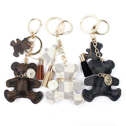 Set of patchwork teddy bear keyrings with gold rings, tassels, and coin charm, mixed black/brown