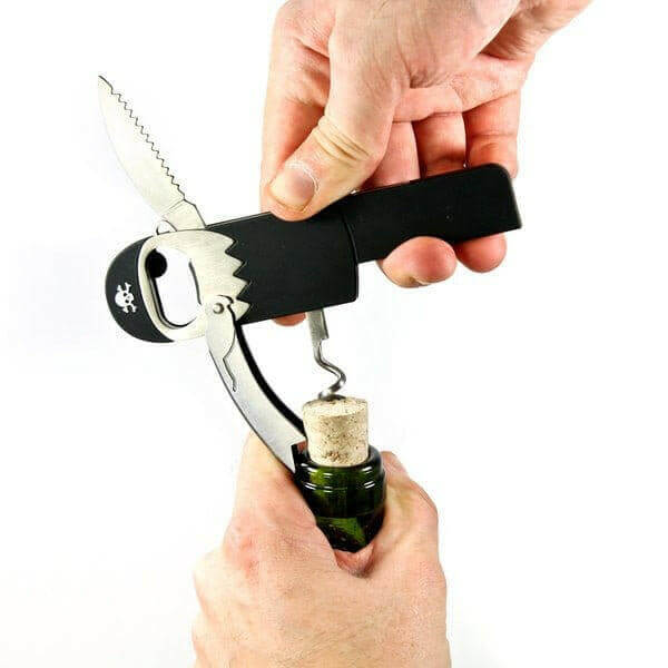 Pirate corkscrew tool in use: black handle with metal cork pull.