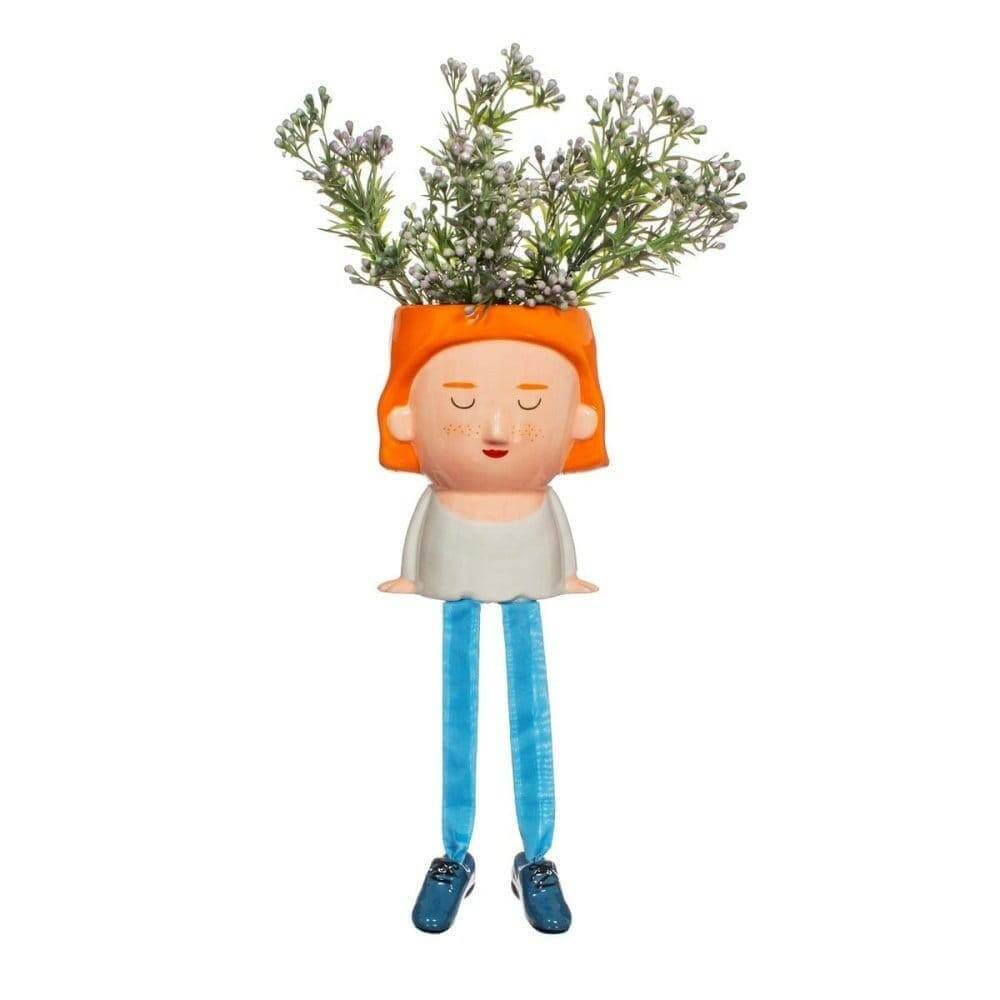 Plant mum planter figure with orange hair and dangling legs, holding a small green plant