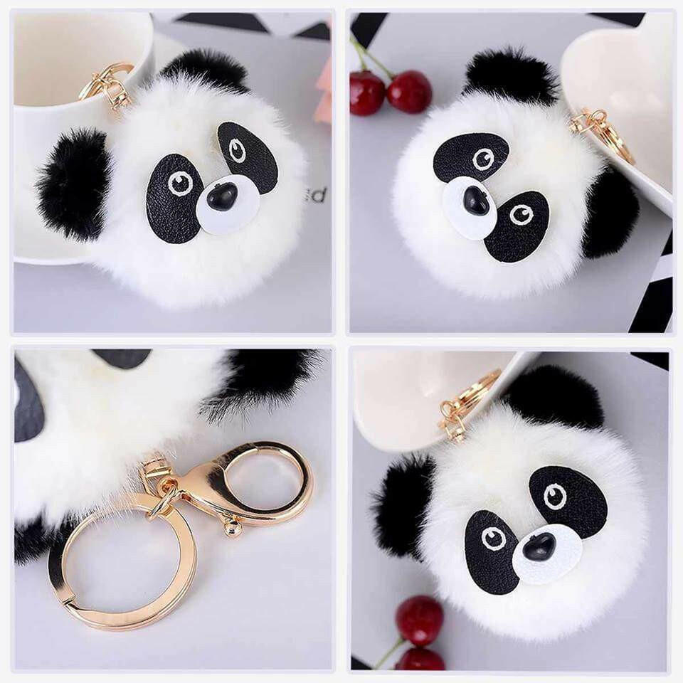 Panda pom pom backpack buddy charm with white fur, black ears, and gold lobster clip