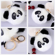 Panda pom pom backpack buddy charm with white fur, black ears, and gold lobster clip